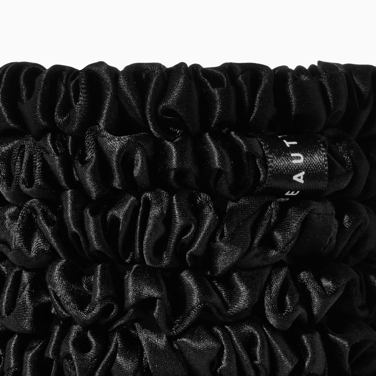 SILKSCRUNCHY-BLACK_73273.PDP_1X1_ECOM_MACRO_2025_WEB