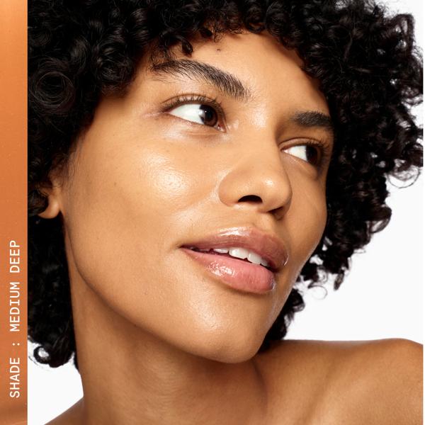 SUPERLUMINOUS_TINTED_SKIN_GLOW_SERUM_MEDIUMDEEP_62541_PDP_ECOM_1X1_MODEL_CROP_2025_WEB